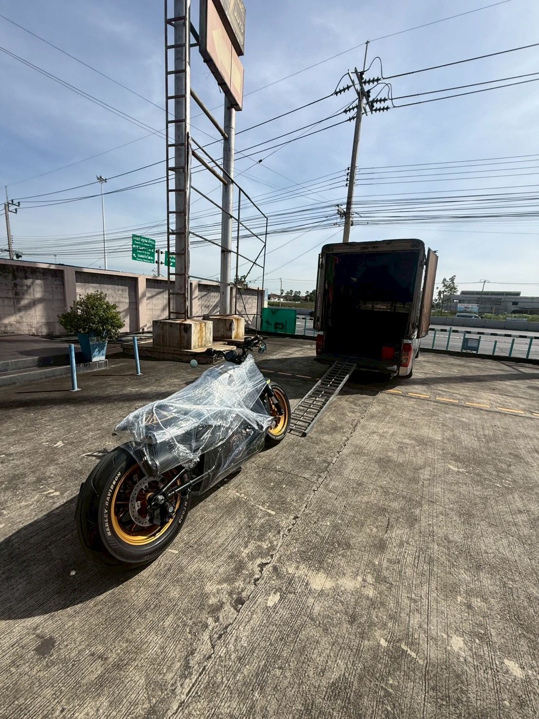 Motorcycles loaded for transport across Thailand